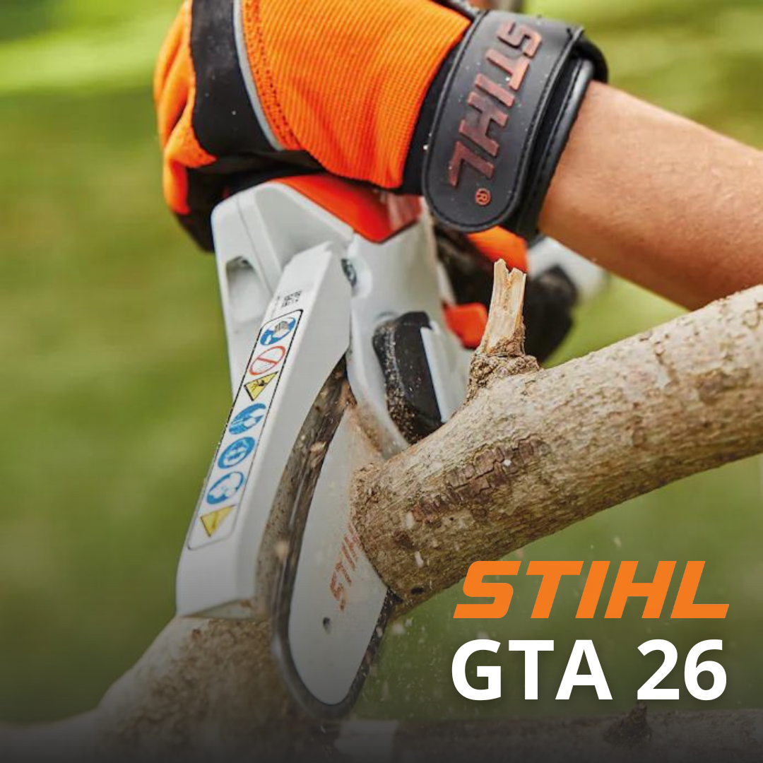 A gloved hand using a STIHL GTA 26 to prune a small branch