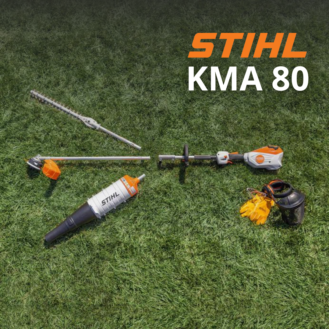 STIHL KMA Kombi 80 powermotor with three attachments next to it lying in grass