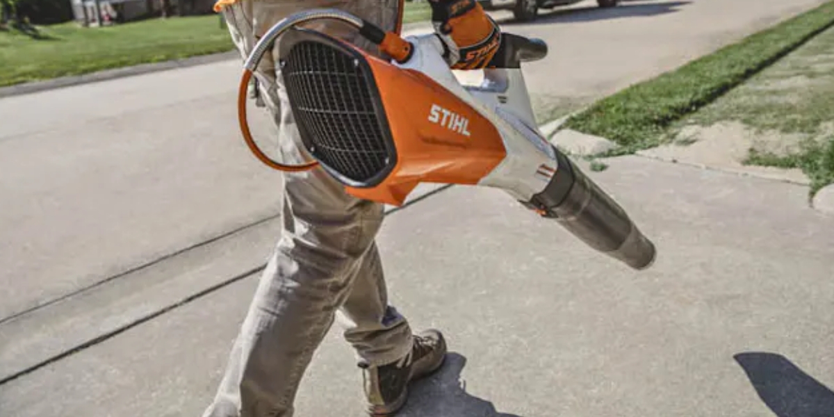 Person walking with STIHL BGA 200 leaf blower